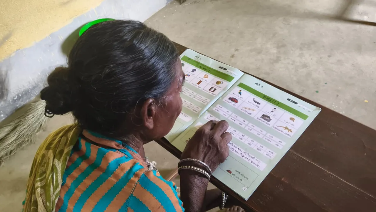 a learner reading a sign