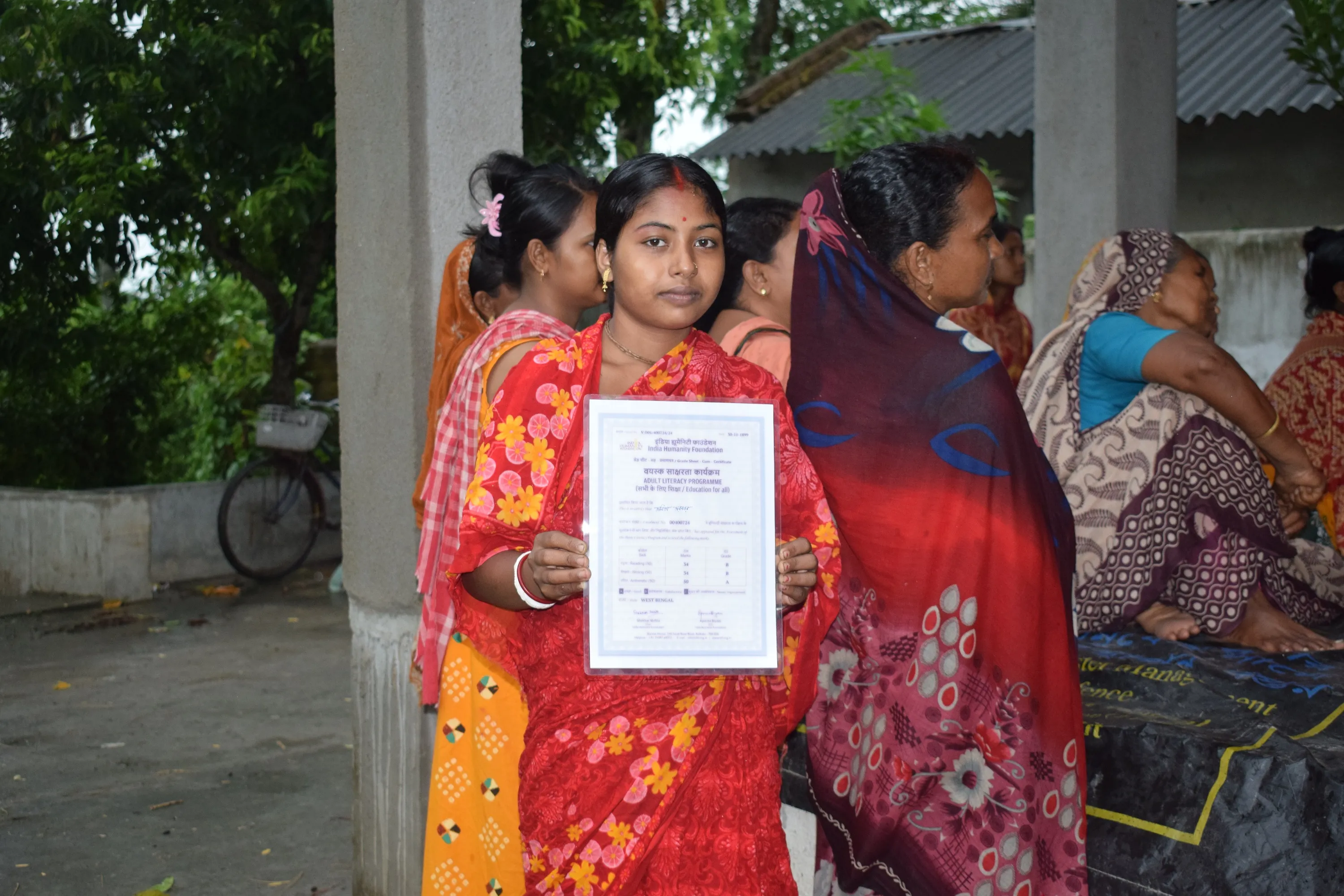 learner-holding-her-certificate